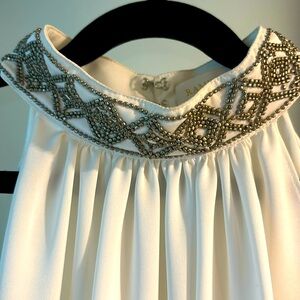 Cream silk halter top with beaded neck detail